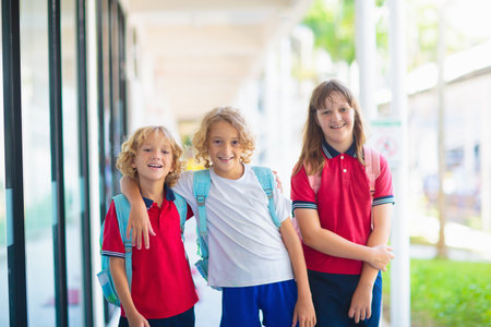 Children go back to school. Start of new school year after summer vacation. Boy and girl with...