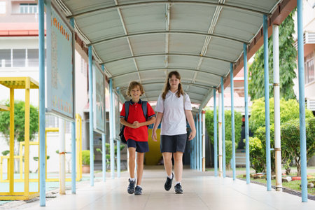 Child happy to be back to school. End or start of summer vacation for school kids. Excited happy...
