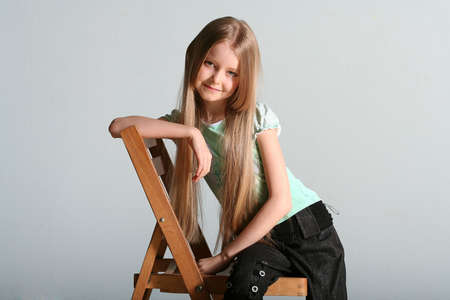 smiling girl looks in a cameraの写真素材