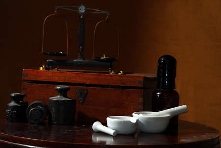 old pharmacists stuff, weights, scales and mortrar