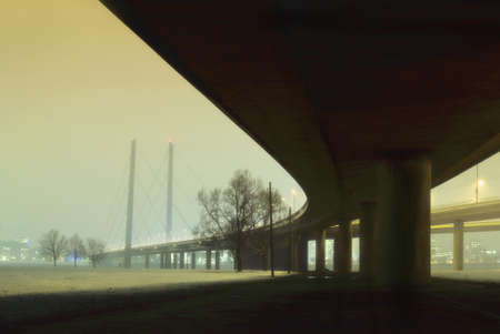 bridge over river rhine near düsseldorf at nightの写真素材