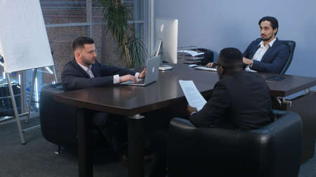 Business conference with team in office. Professional shot in 4K resolution. 085. You can use it e.g. in your commercial video, business, presentation, broadcast video.の写真素材