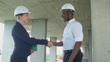 Handshake on construction siteの写真素材