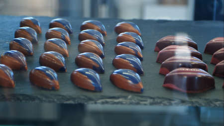 Chocolate candy in a store windowの写真素材