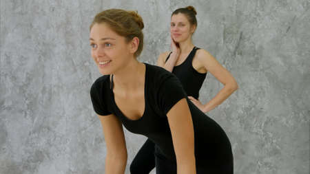 Portrait of a positive young black woman practicing yoga and laughingの写真素材