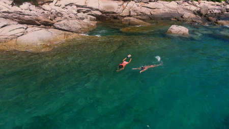 The tourists are swimming with maskの写真素材