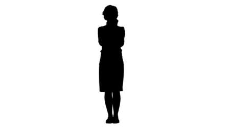 Silhouette Beautiful young woman eating an apple track matteの写真素材