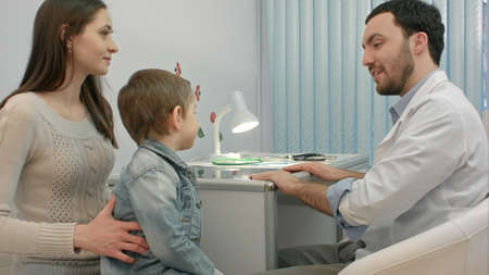 Mother And Child Visiting Doctors Officeの写真素材