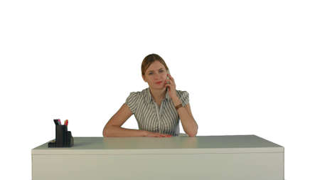 Business woman in office with phone on white background isolatedの写真素材