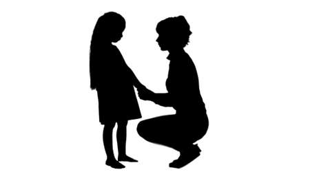 Silhouette Mother and daughter talking track matteの写真素材