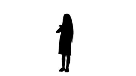 Silhouette Small girl with tablet computer track matteの写真素材