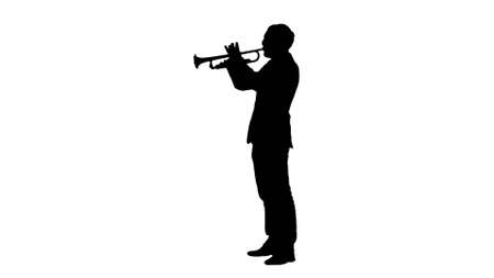Silhouette Man standing and trumpet melody.の写真素材