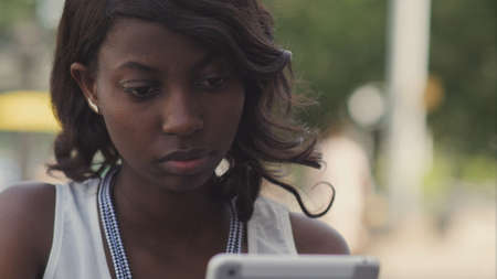 African american woman using her tabletの写真素材