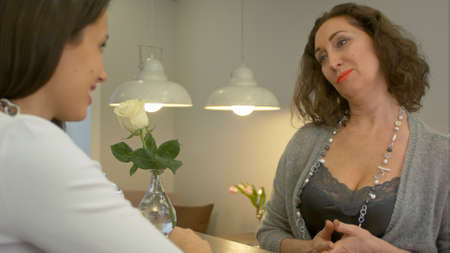 Attractive woman shopping and looking at jewelryの写真素材