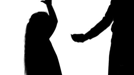 Silhouette Happy mother giving high five to her little daughter track matteの写真素材