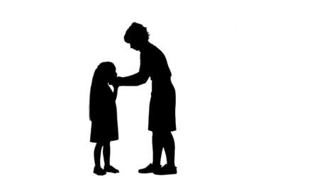 Silhouette Young mother put on medical mask to her little girl track matteの写真素材
