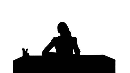 Silhouette Business woman in office with phoneの写真素材