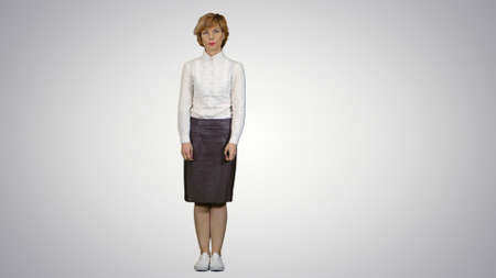 Cheerful speaker making business presentation on white backgroundの写真素材