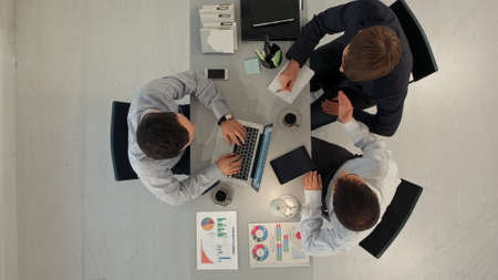 Top view of Business partners discussing documents and ideas at meetingの写真素材