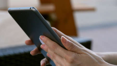 Young Woman Using Digital Tablet PCの写真素材
