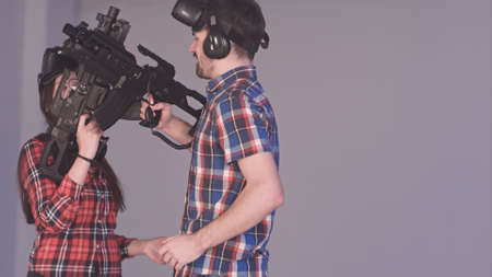 Young couple being happy about their win in virtual reality game