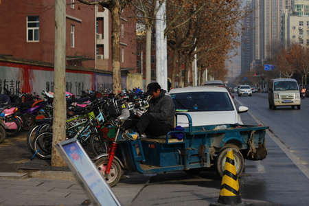 Workers on a tricycleのeditorial素材