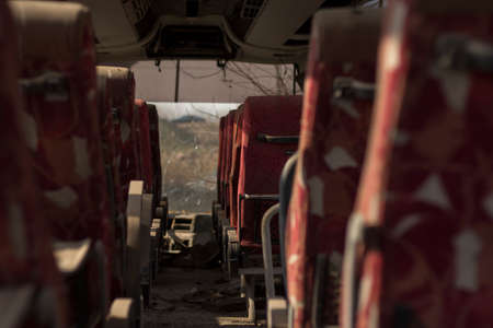 Interior of an abandoned busの写真素材