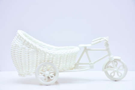 rattan bicycle toy isolated on white