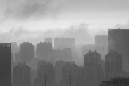 Foggy cityscape in black and white tone. Abstract urban background.の写真素材