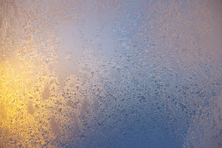 frozenned glass, Ice on window,winter icy patternsの写真素材
