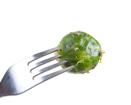 Brussels sprouts on fork.Vegetable dishの写真素材