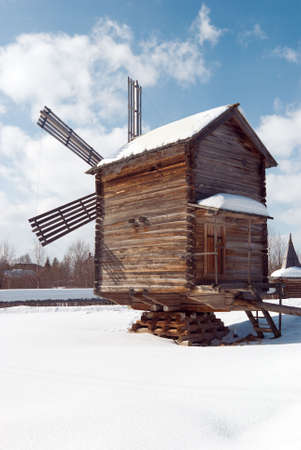 Wind mill  .winter rural landscape.Russian traditional architectureの写真素材