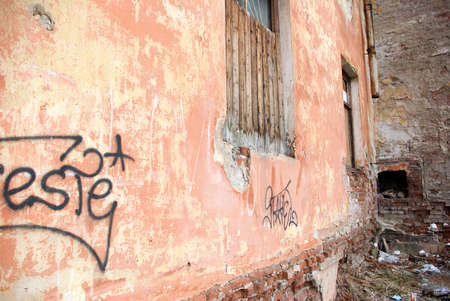  graffiti on a wall .Aging destroyed brick wall.の写真素材