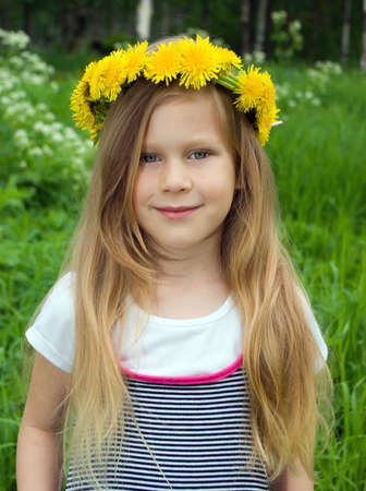 girl with dandelion.Beauty Girl in green meadowの写真素材