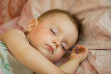 Sleeping tot,small boy,breast child,Shallow DOFの写真素材