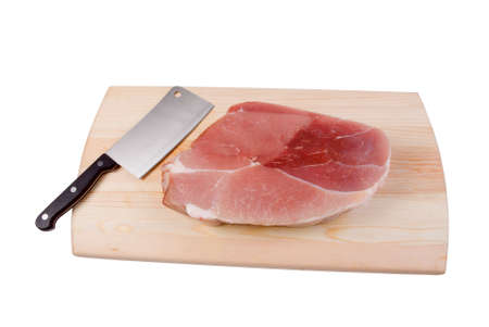 Chopping of meaton wooden board .cutlass and fresh  porkの写真素材