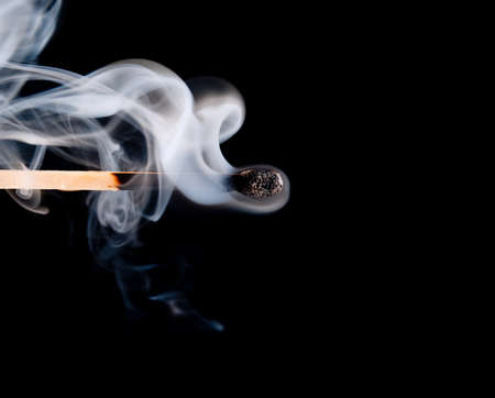 Smoke from a match that was just put outの写真素材