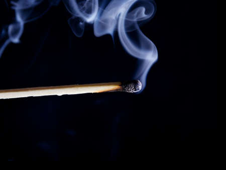 Smoke from a match that was just put out .close-upの写真素材