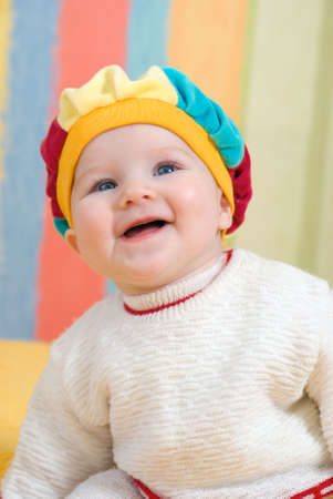 small caucasian girl smiles.girl infant is daredの写真素材