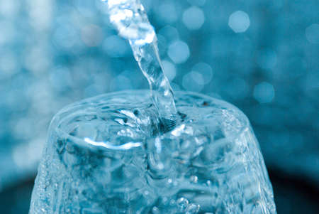 Macro of water poured into a glass r  .crystal gobletの写真素材