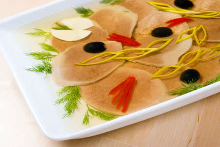 Aspic from meat with egg,olivesの写真素材