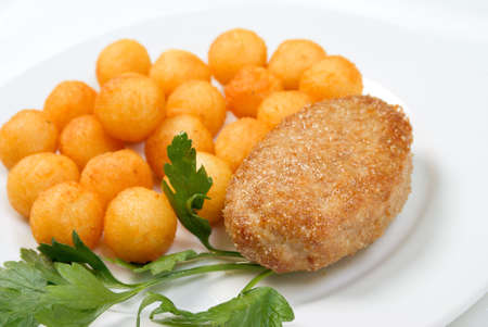 chops with potatoes on plate.closeupの写真素材