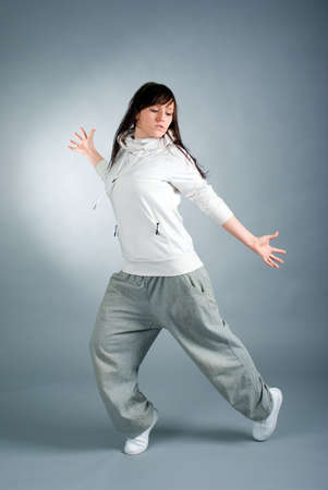 modern style dancer posing on  gray background の写真素材