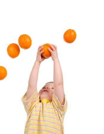 boy hunts for orange isolated on white backgroundの写真素材
