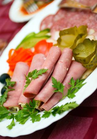 Beautiful sliced food arrangement .meat and sausageの写真素材