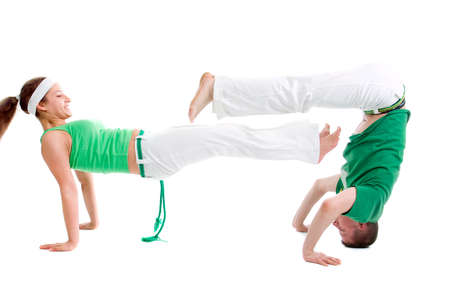  Contact Sport .Capoeira.over white background の写真素材