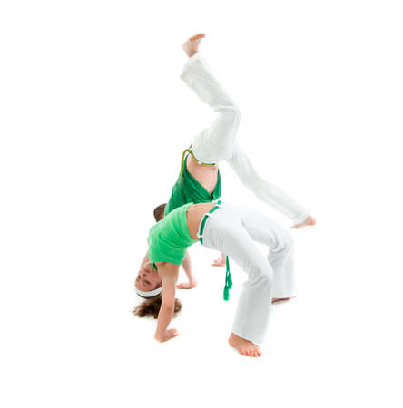 Contact Sport .Capoeira.over white background の写真素材