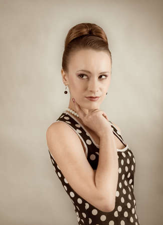 beautiful lady in a polka dot dress.  60s style の写真素材