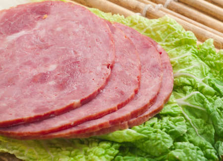 Beautiful sliced food arrangement of meat, bread and vegetables 