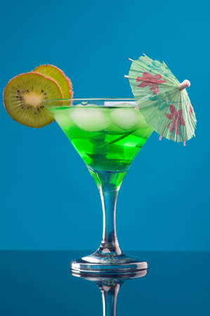 tropical green cocktail  closeup on blue background.の写真素材
